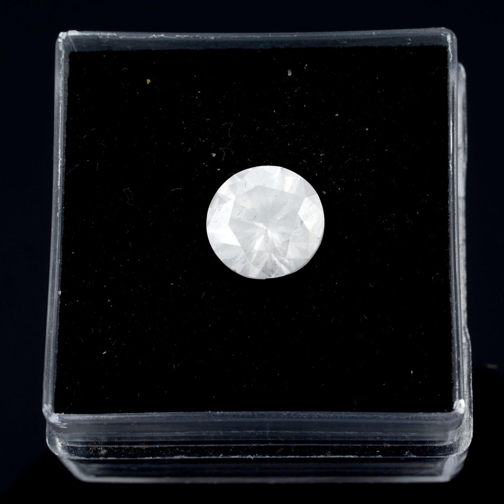 A brilliant fancy white diamond, weighing 1.69ct with GIA cert.