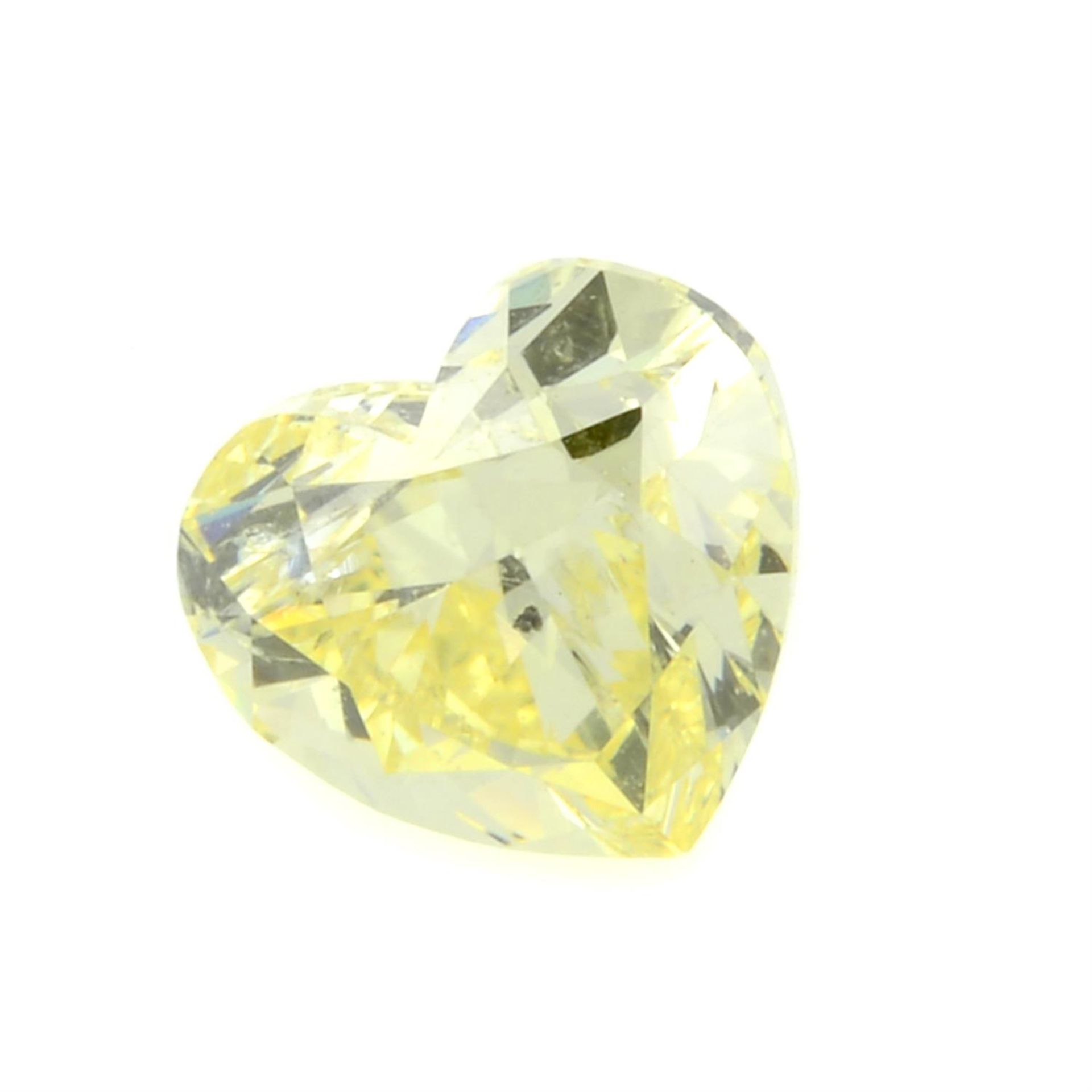 A heart shape natural fancy yellow diamond, weighing 0.50ct