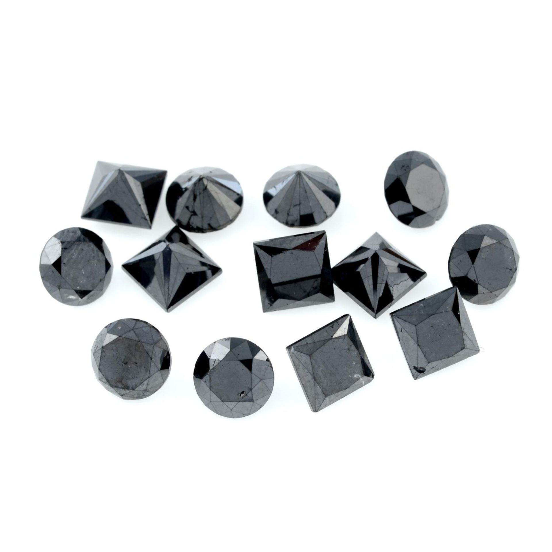 Six square shape and seven circular shape black gemstones, weighing 22.36ct
