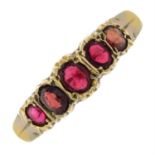 A 9ct gold garnet five-stone ring.