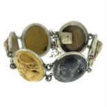 A mid 19th century carved lava cameo bracelet.