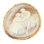 A mid 20th century shell cameo brooch/pendant, depicting a man and woman in a classical scene.