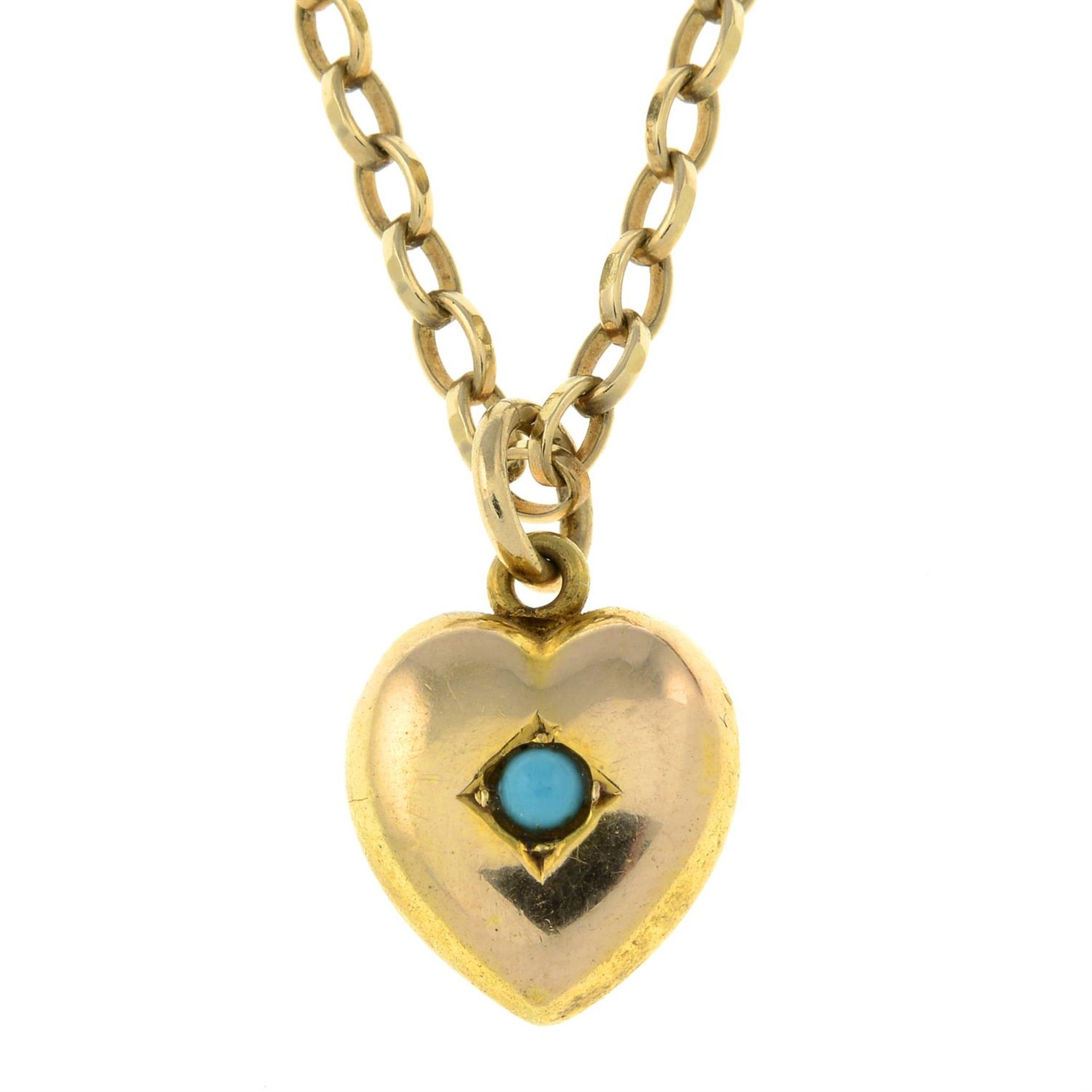 A heart pendant, with turquoise highlight, suspended from a 9ct gold chain.