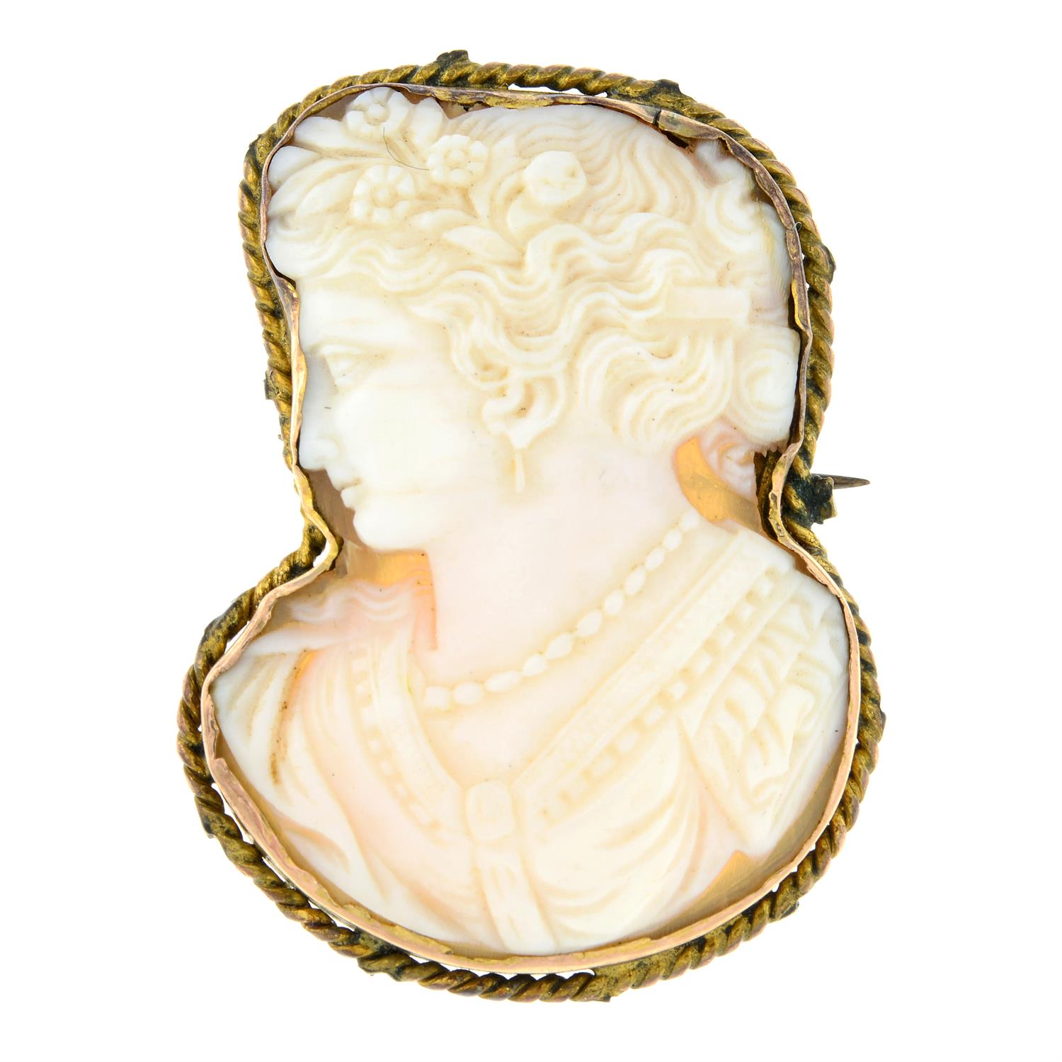 A shell cameo brooch, depicting a lady in profile.