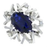 A synthetic sapphire and diamond cocktail ring.