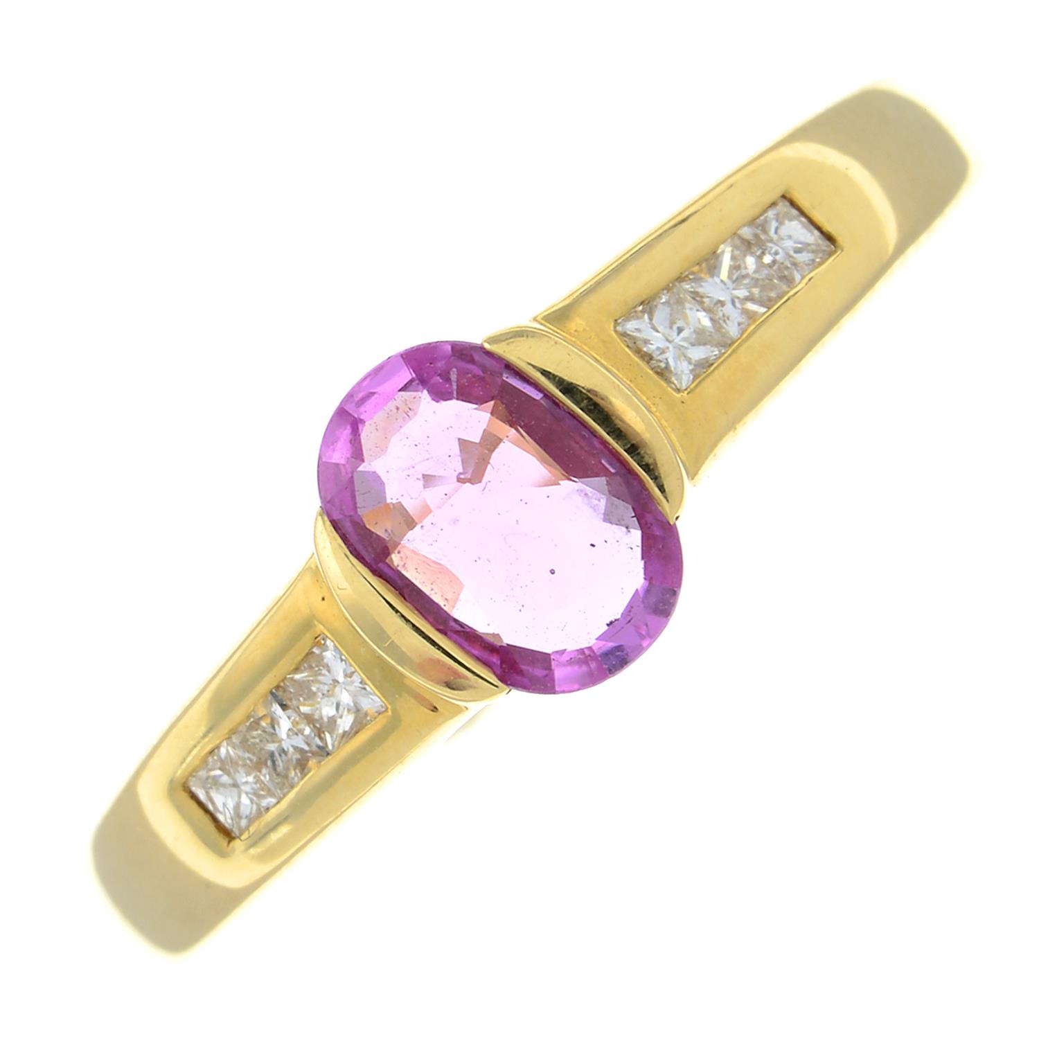 An 18ct gold pink sapphire and diamond dress ring.