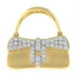 An 18ct gold diamond handbag pendant.