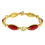 A coral line bracelet, with oriental character spacers.