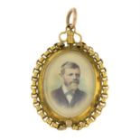 An Edwardian 9ct gold portrait miniature locket pendant.