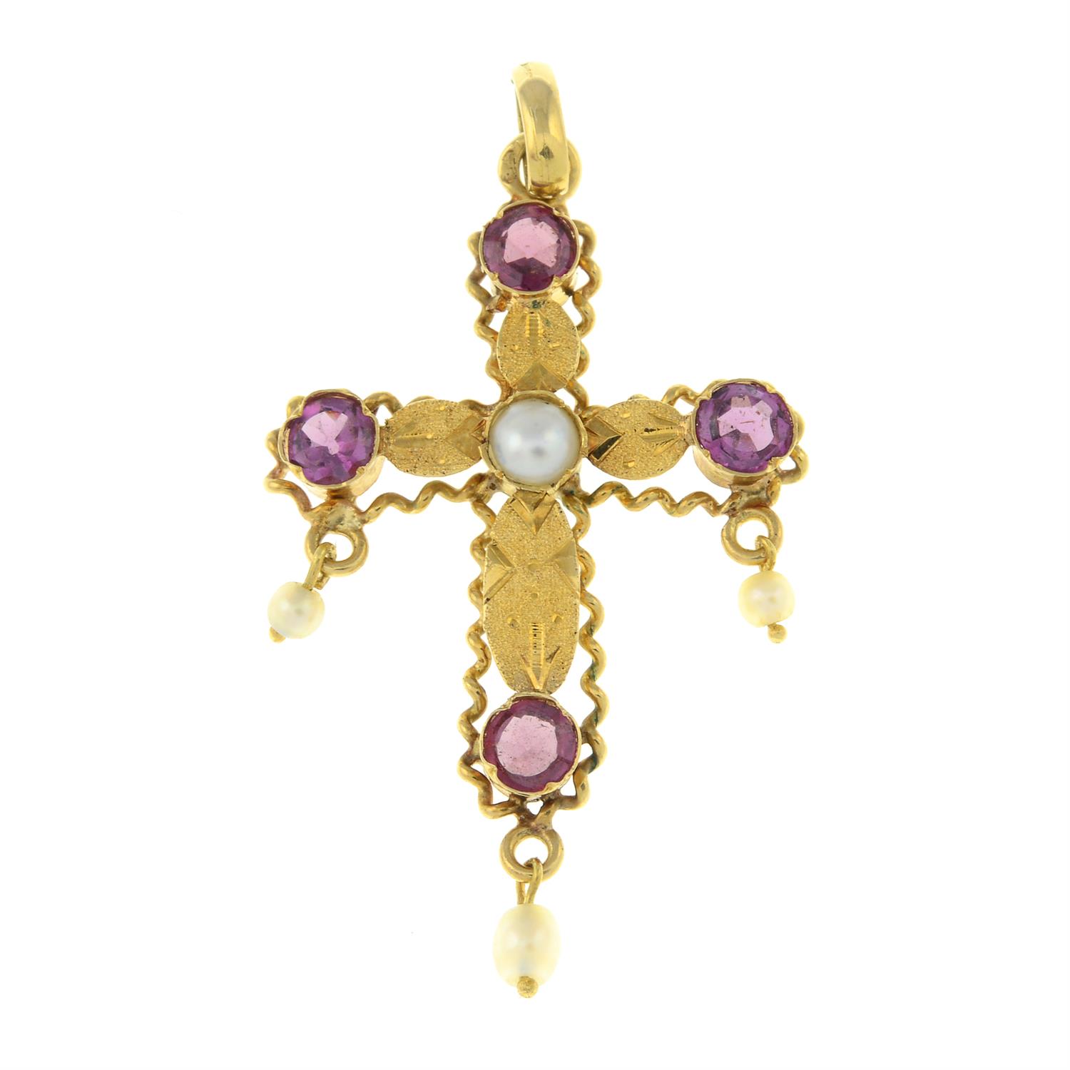 An early 20th century garnet and seed pearl cross pendant.