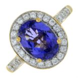 A tanzanite and diamond cluster ring. AF.