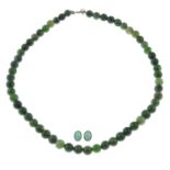 A nephrite beaded necklace, together with a pair of chalcedony cabochon stud earrings.