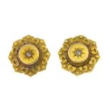 A pair of late 19th century 15ct gold stud earrings, with diamond point highlights.