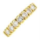 An 18ct gold diamond half eternity ring.