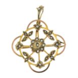 An early 20th century 9ct gold split pearl openwork pendant.