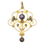 An early 20th century 9ct gold amethyst and split pearl pendant.