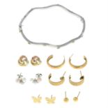 A selection of jewellery, comprising a bangle and six pairs of earrings.