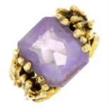 An amethyst abstract ring.