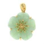 A jade flower pendant.