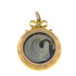 An early 20th century 9ct gold double-sided photo locket.