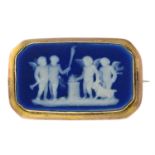 A late 19th century 9ct gold jasperware cameo brooch, depicting cherubs before an altar,