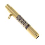 An early 20th century 9ct gold enamel retractable pencil, with rotating calendar component.