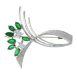 A diamond and composite green gem brooch.