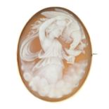 An early 20th century 9ct gold shell cameo brooch, depicting Hebe and Zeus as an eagle.