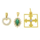 Three diamond and emerald pendants.