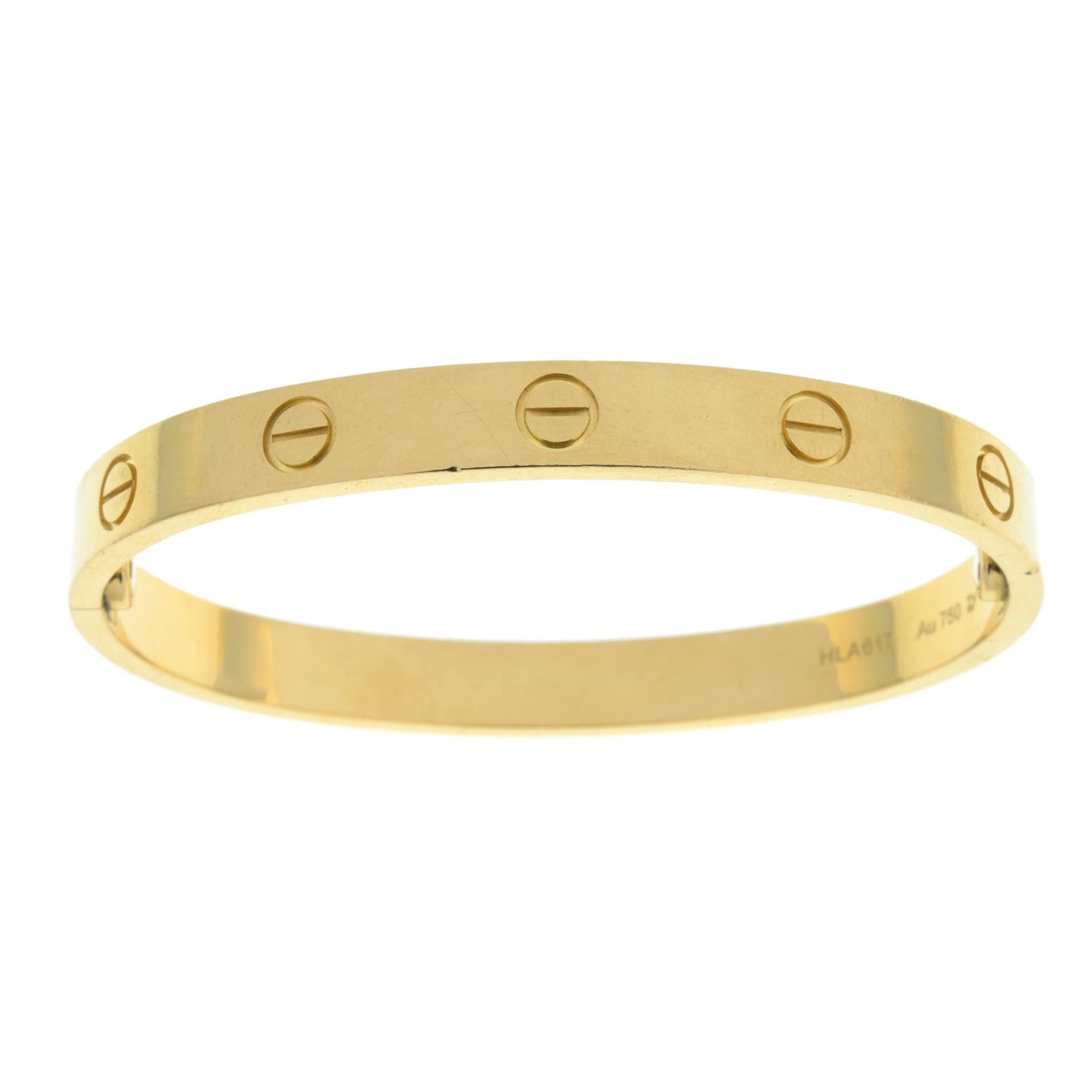 An 18ct gold 'Love' bangle, by Cartier. - Image 4 of 4