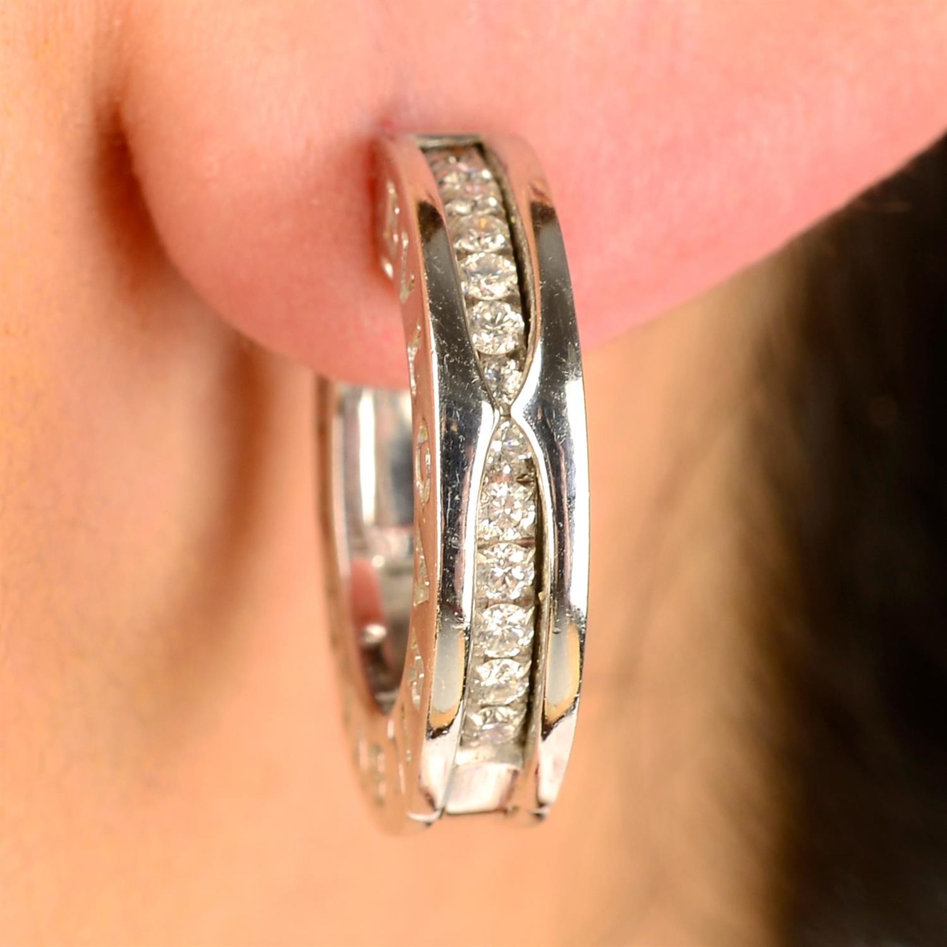 A pair of brilliant-cut diamond 'B.Zero1' hinged hoop earrings, by Bulgari.