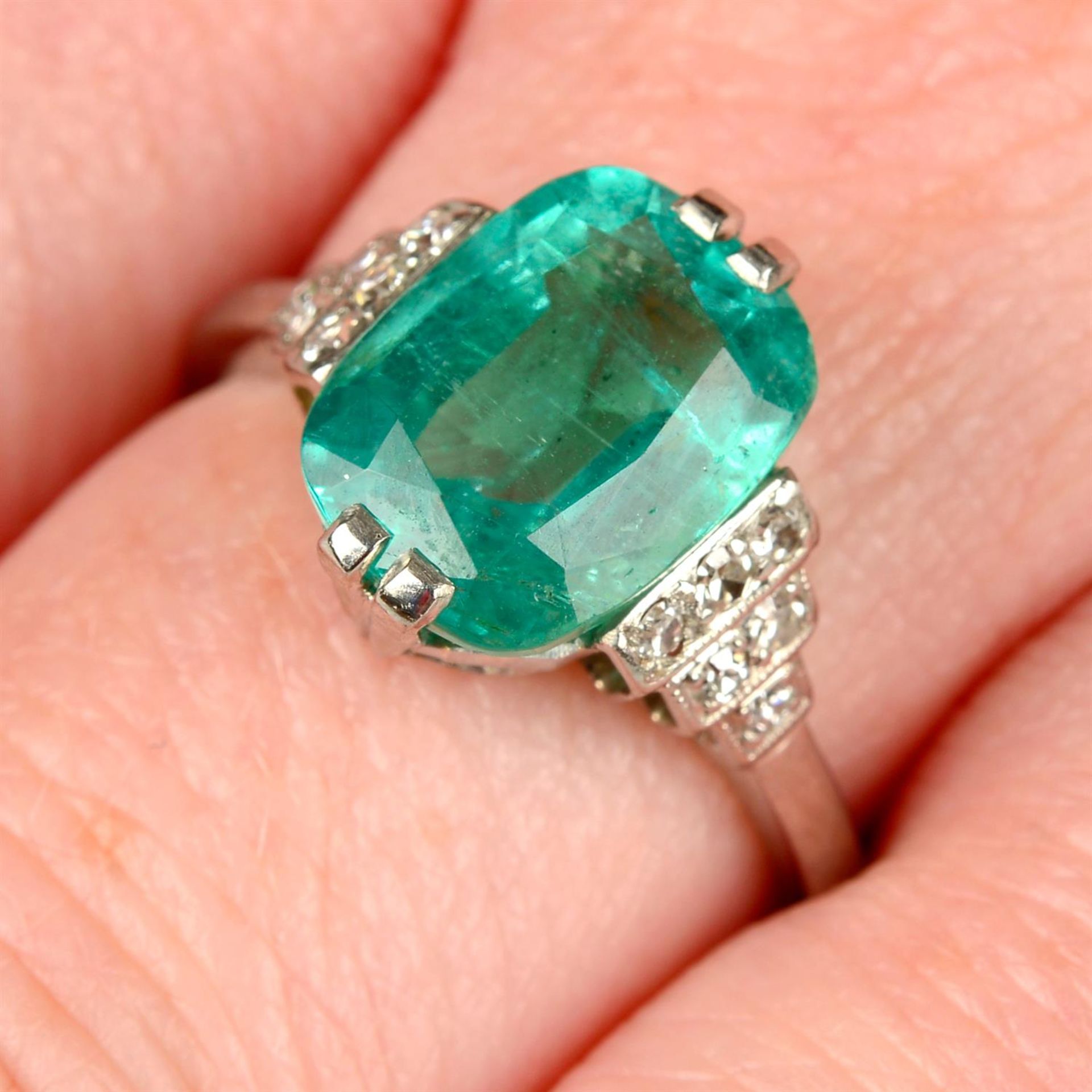A Brazilian emerald and single-cut diamond dress ring.