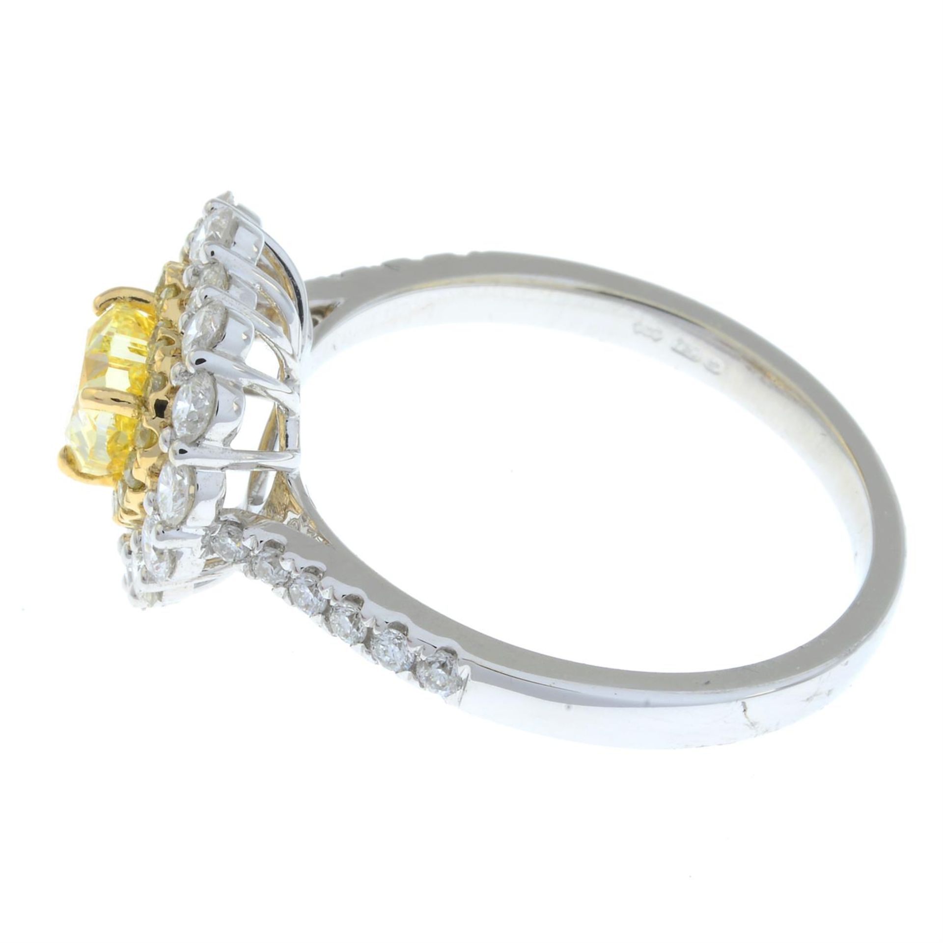 An 18ct gold Fancy Intense Yellow heart-shape diamond, 'yellow' diamond and diamond cluster ring. - Image 4 of 6