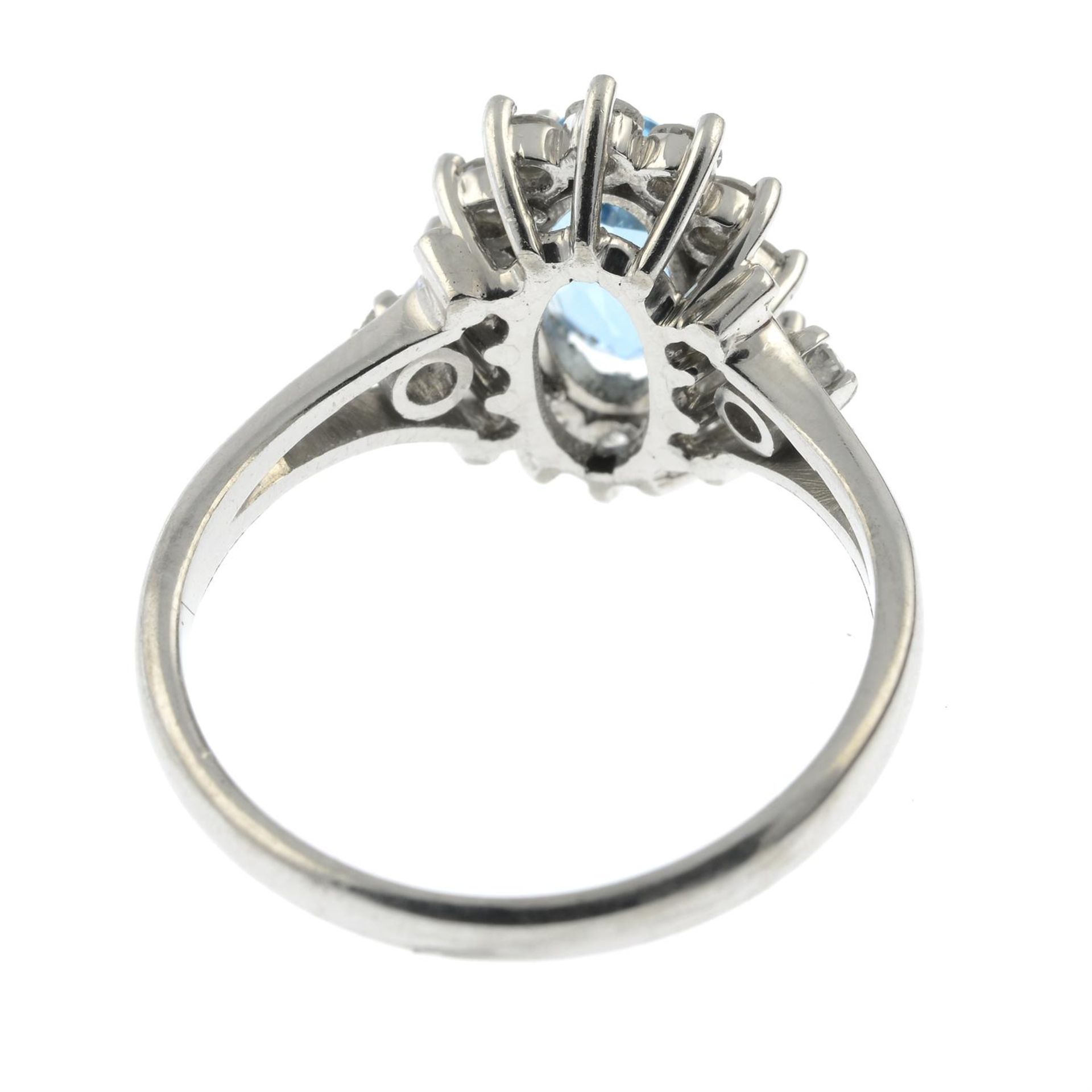 A platinum, aquamarine and brilliant-cut diamond cluster ring. - Image 4 of 5