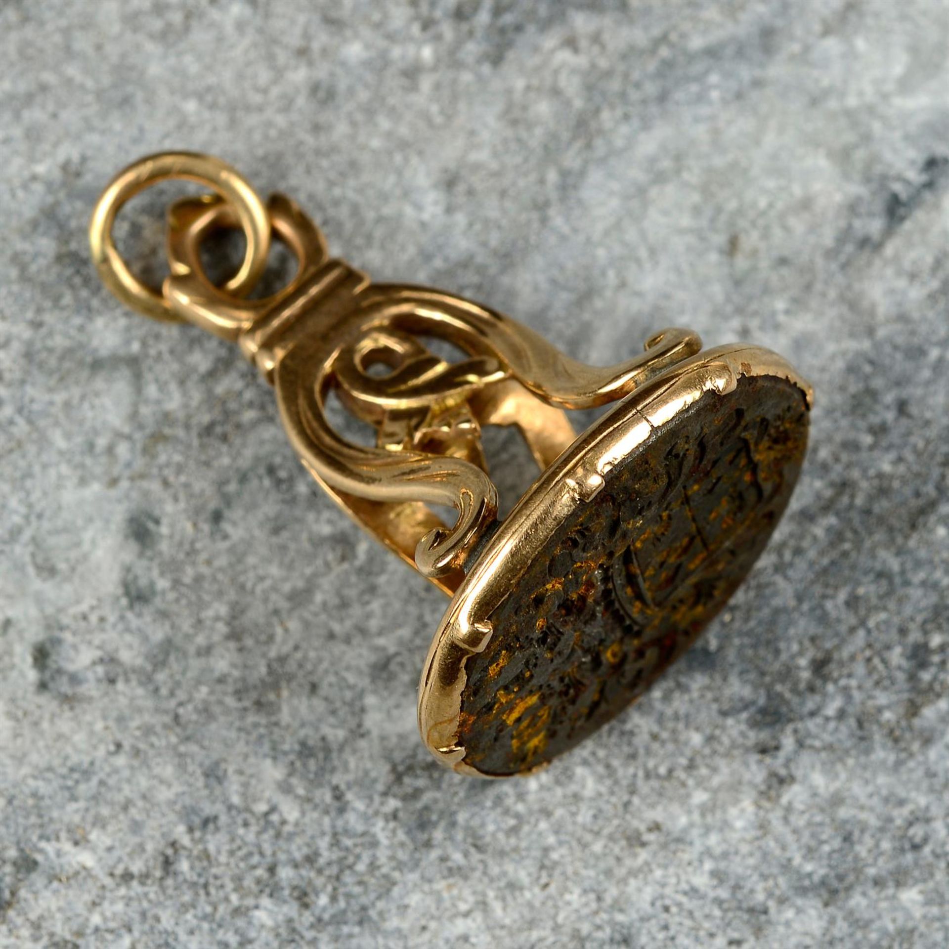 A Georgian gold mounted steel armorial fob.