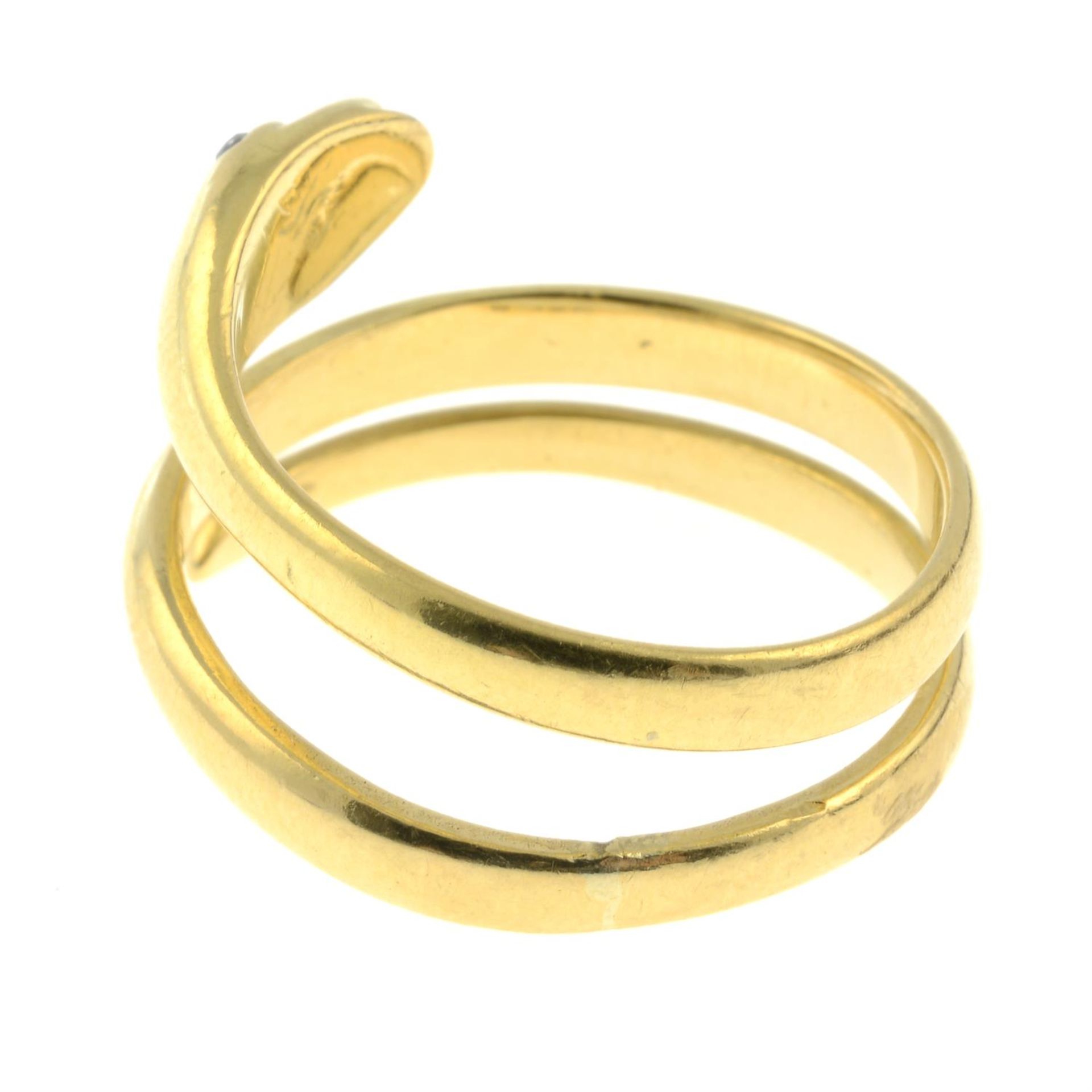 An 18ct gold snake ring, with diamond point eyes. - Image 3 of 5