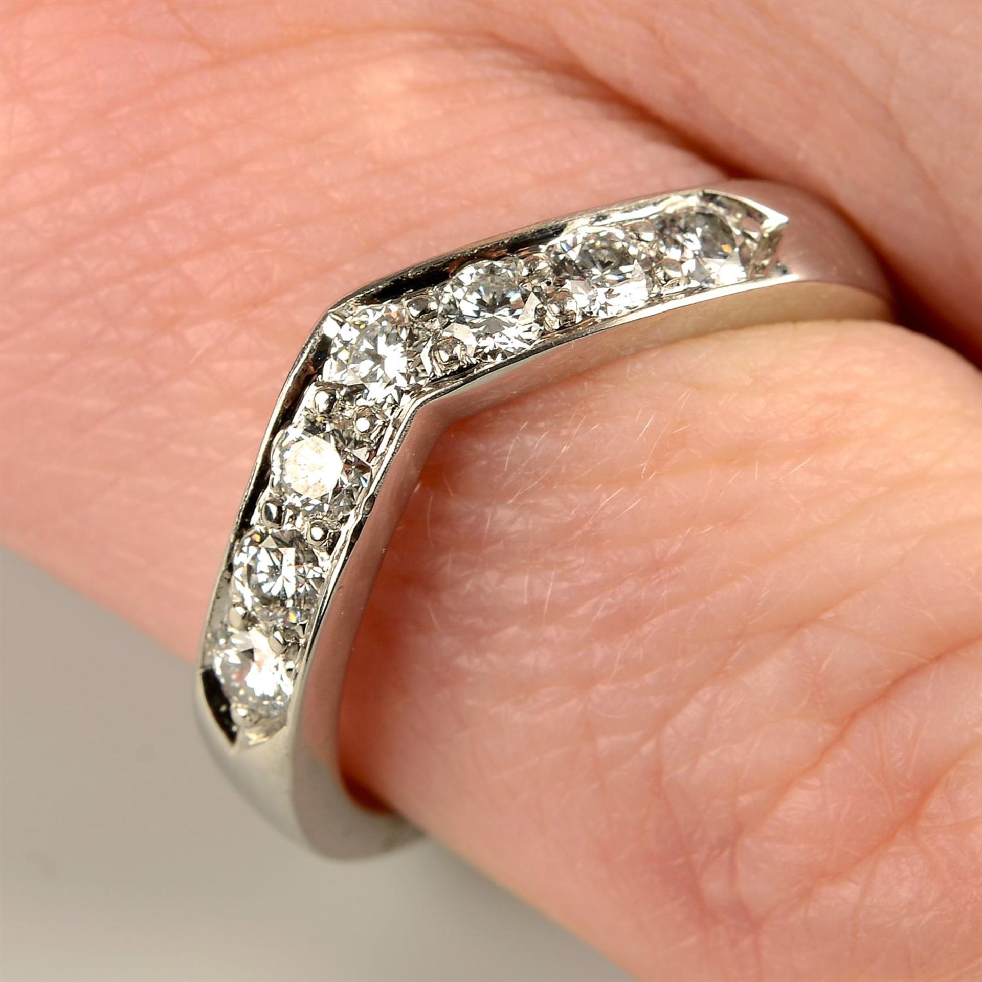 A brilliant-cut diamond chevron ring, by Tiffany & Co.