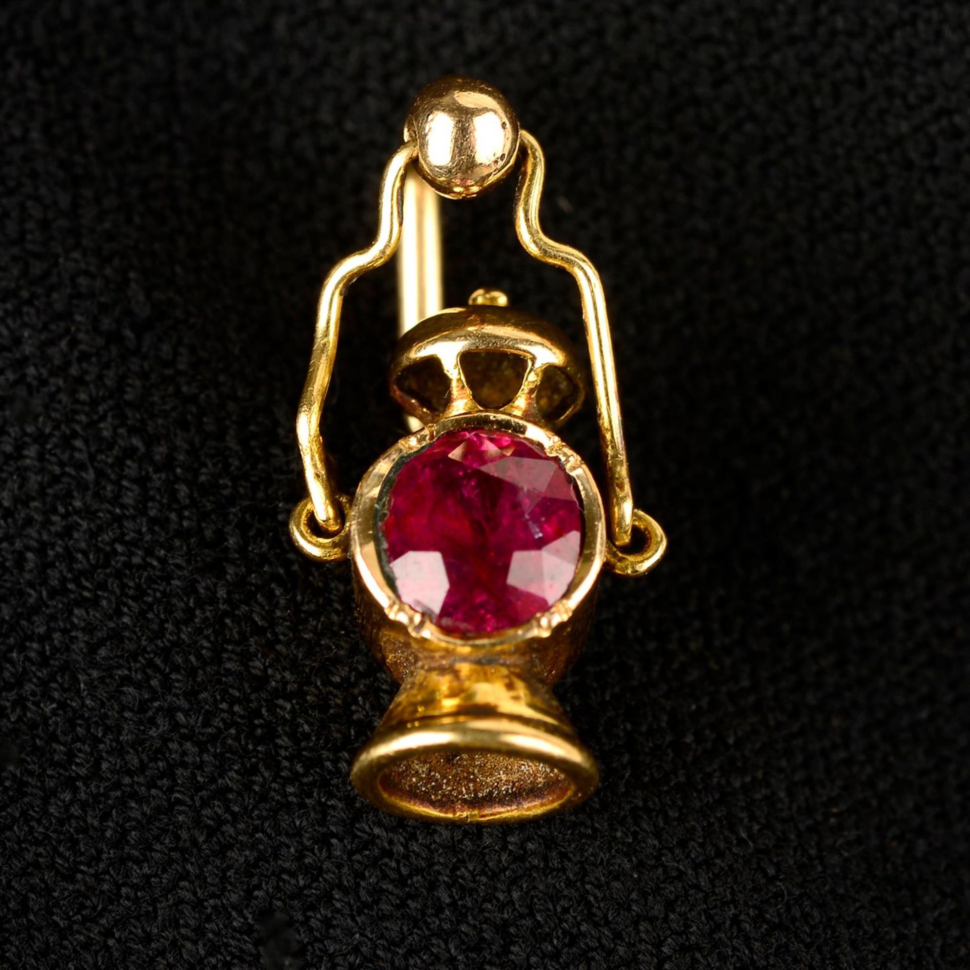 A late 19th century 14ct gold ruby lantern stickpin.