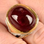 An 18ct gold purplish red tourmaline and brilliant-cut diamond dress ring.