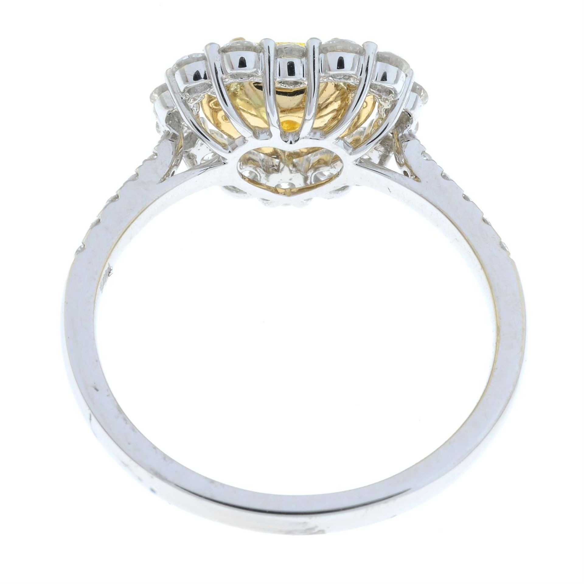 An 18ct gold Fancy Intense Yellow heart-shape diamond, 'yellow' diamond and diamond cluster ring. - Image 3 of 6