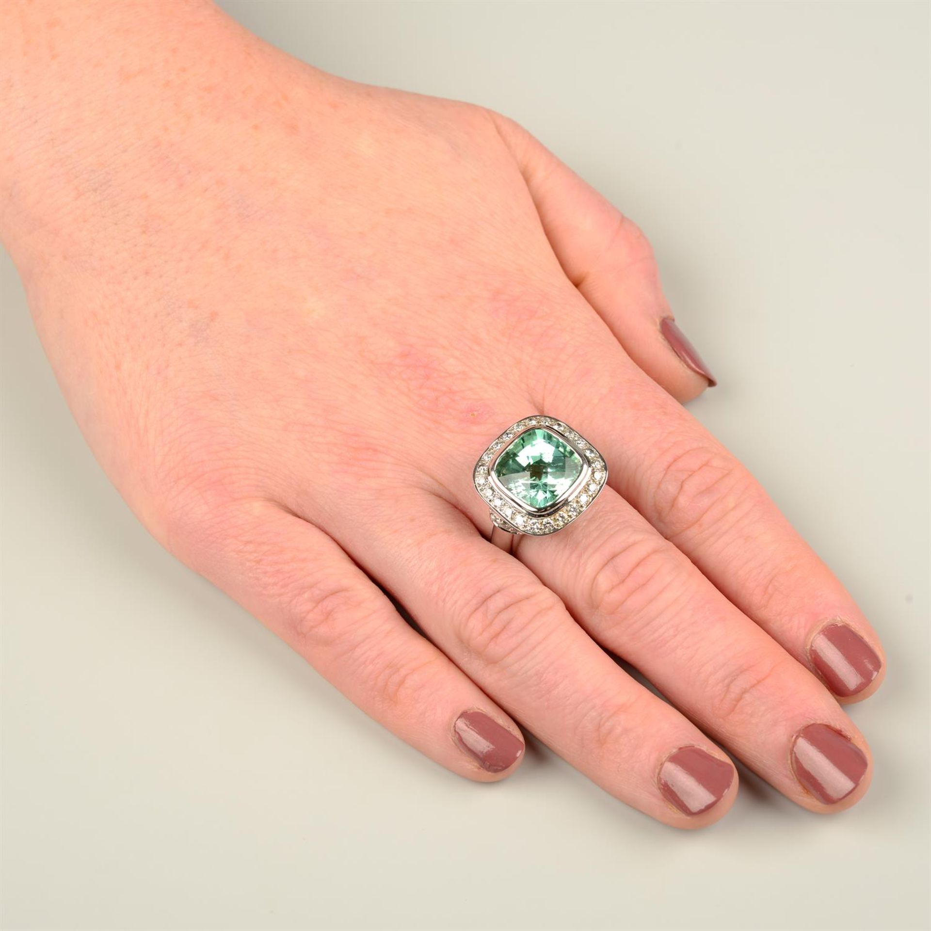 An 18ct gold bluish green tourmaline and diamond dress ring, with 'pink' diamond highlight, - Image 5 of 5