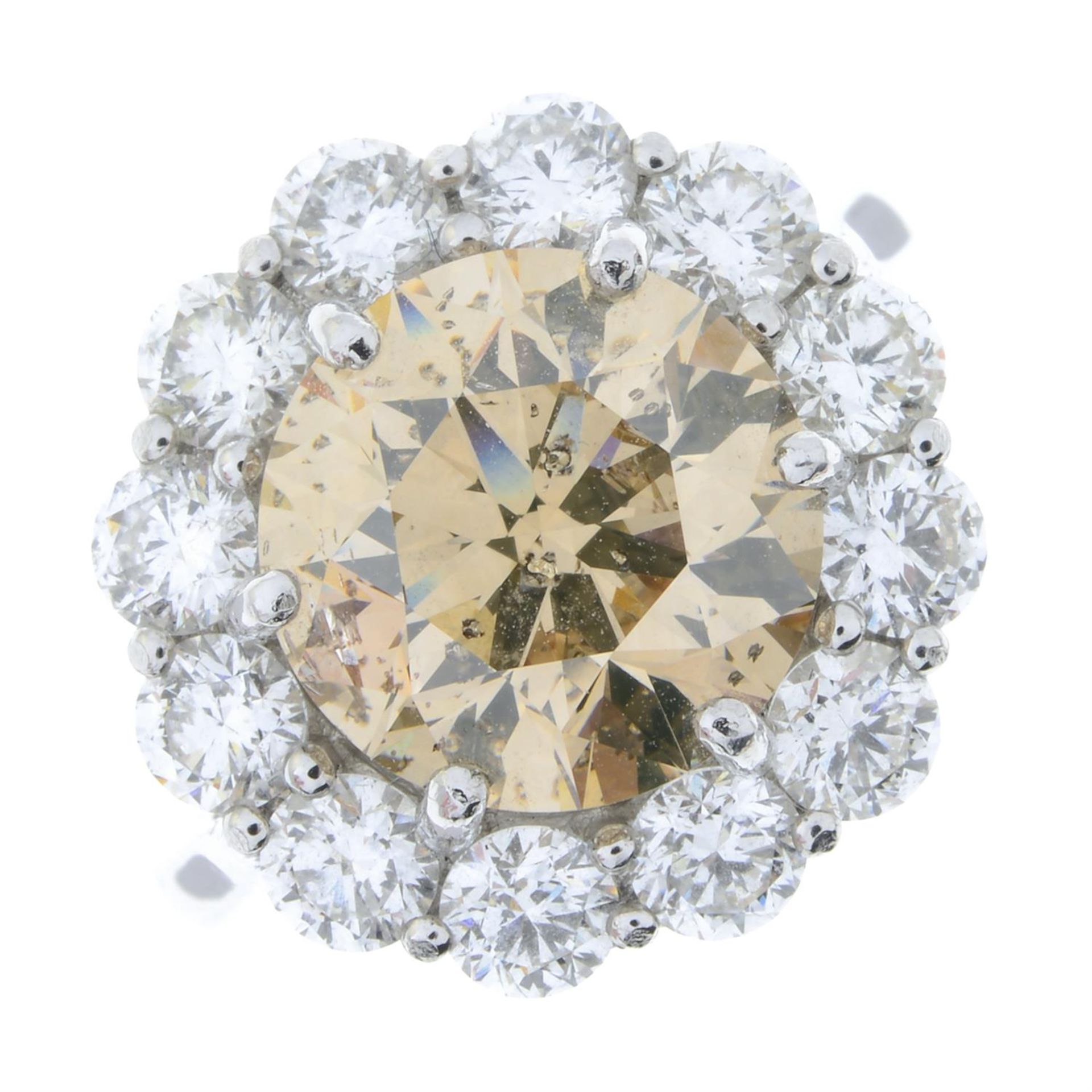 A platinum 'brown' diamond and brilliant-cut diamond cluster ring. - Image 2 of 5