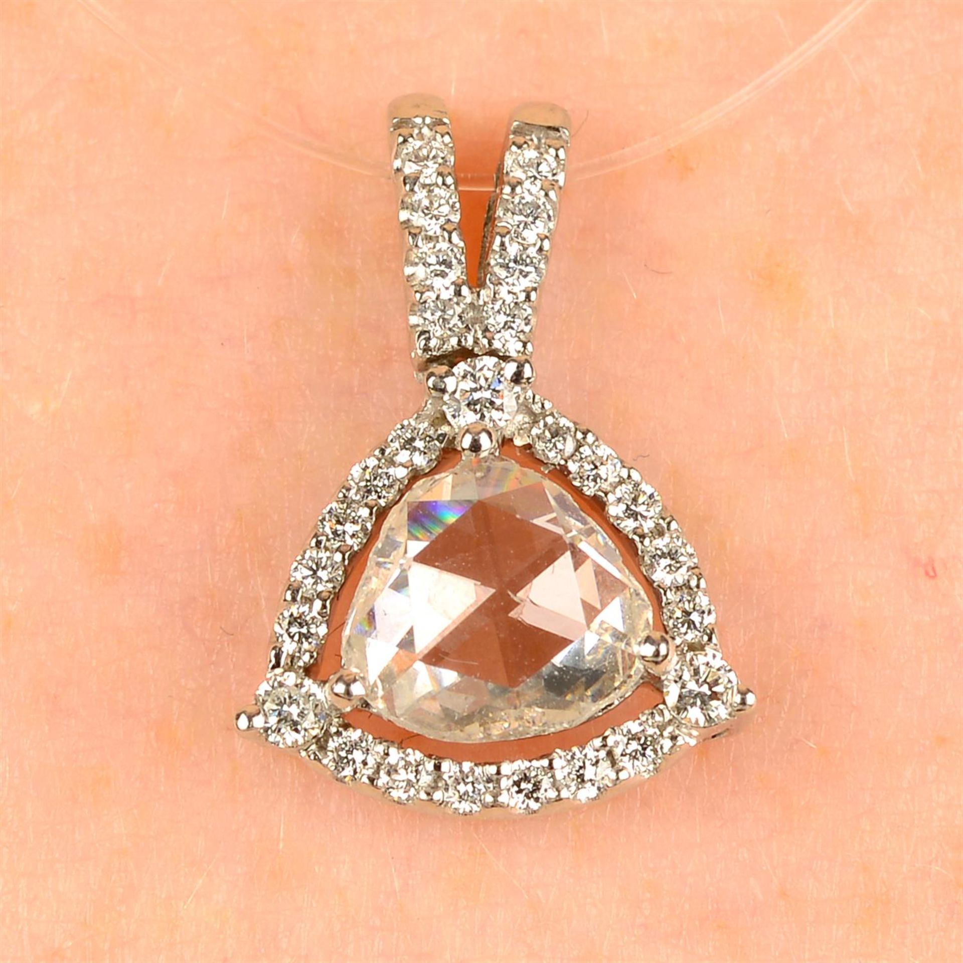 A platinum rose-cut diamond and brilliant-cut diamond cluster pendant.