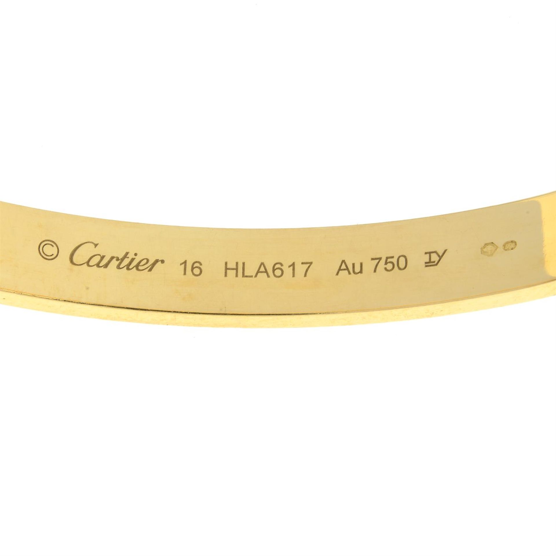 An 18ct gold 'Love' bangle, by Cartier. - Image 3 of 4