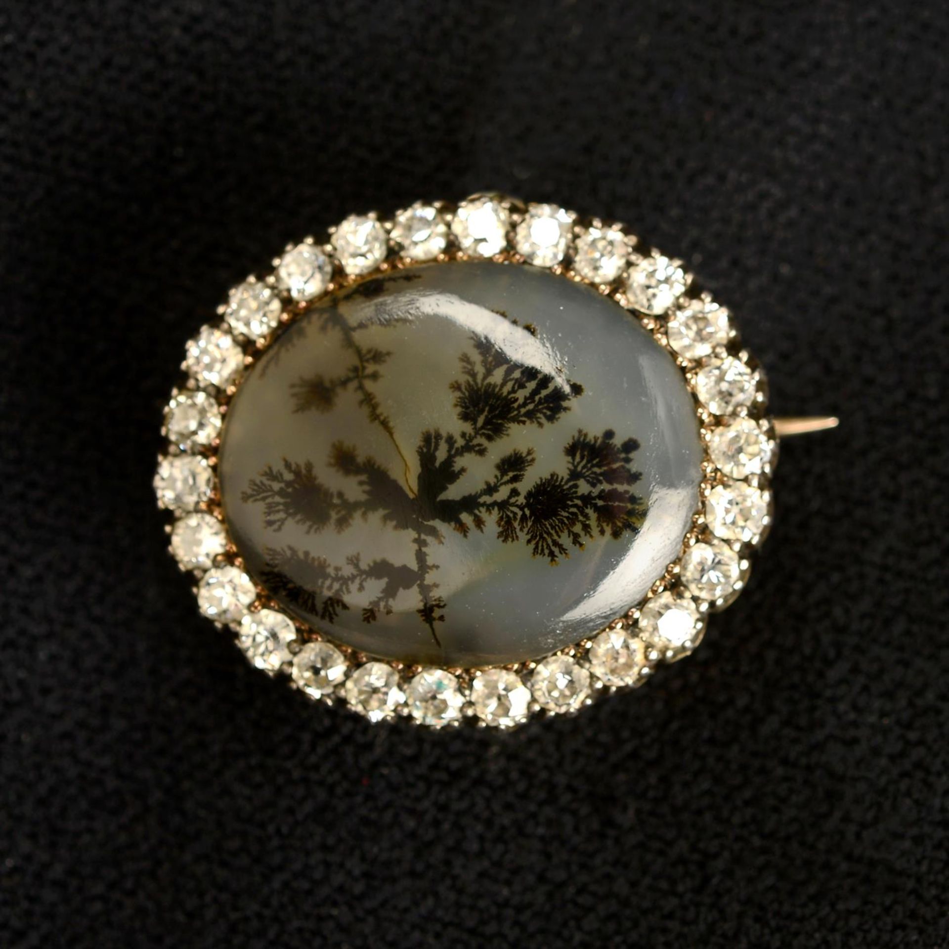A 19th century silver and gold moss agate brooch, with old-cut diamond surround.