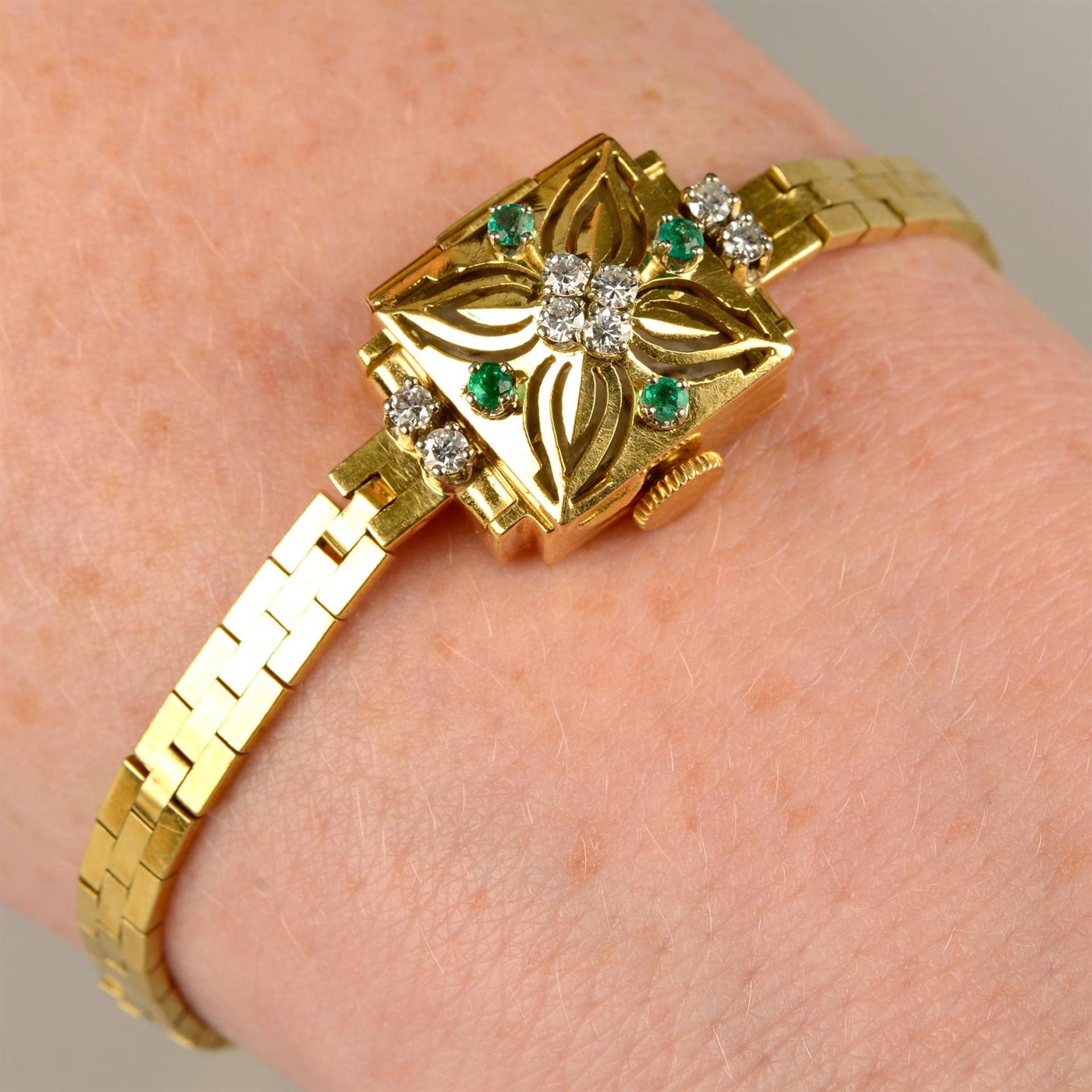 A lady's single-cut diamond and emerald cocktail watch, by Rolex.