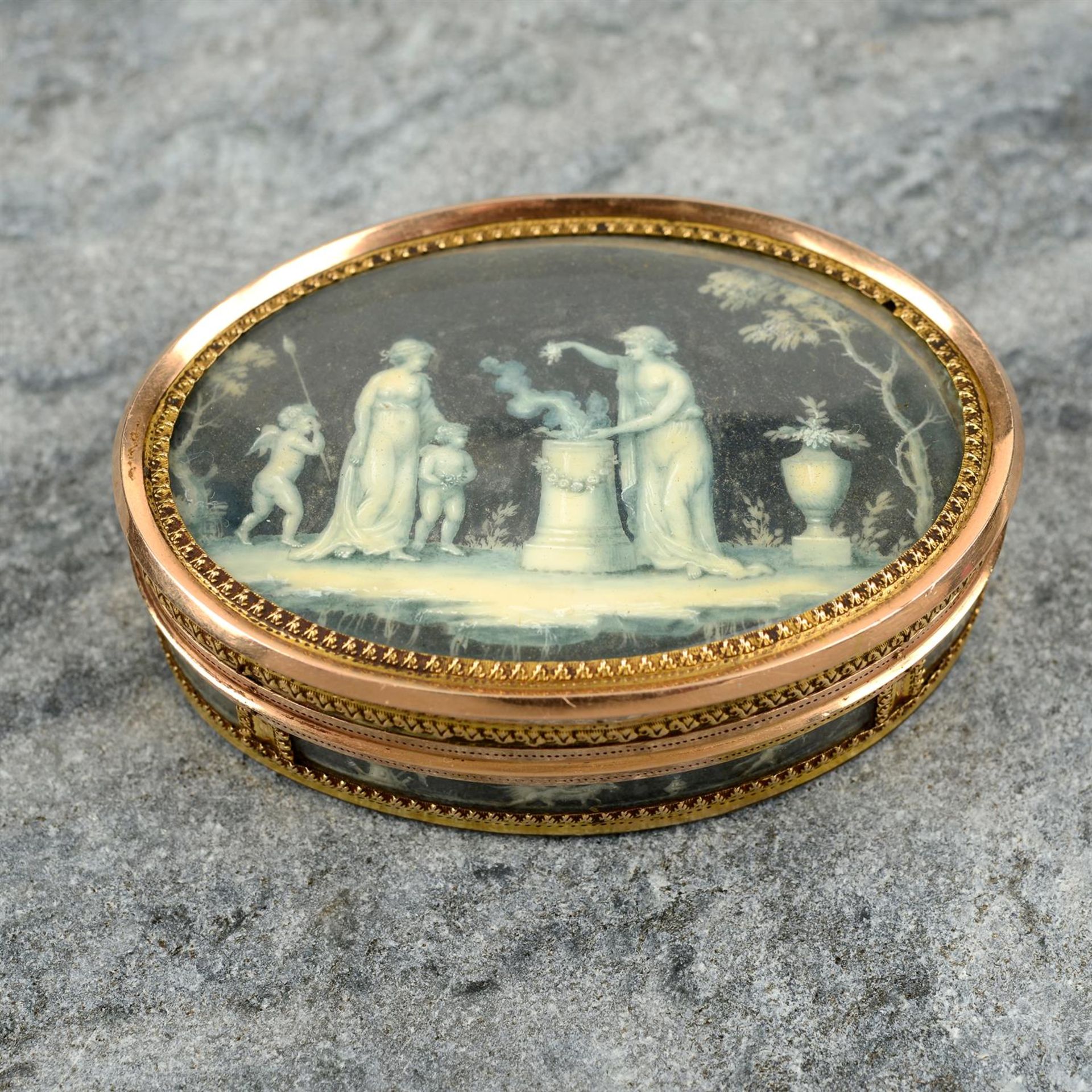 A late 18th/early 19th century gold painted box, the lid believed to depict a version of 'Le