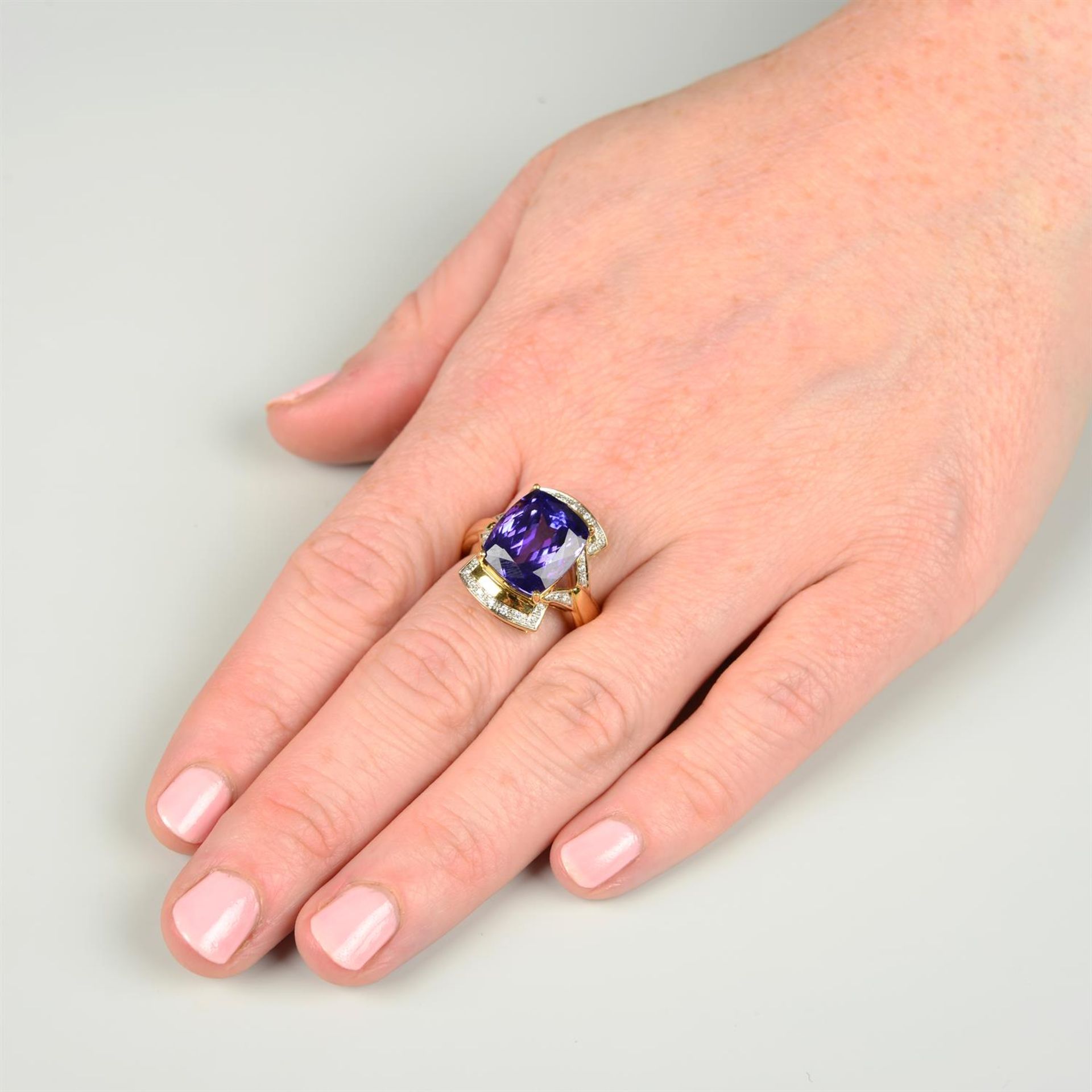 An 18ct gold tanzanite and brilliant-cut diamond dress ring. - Image 6 of 6