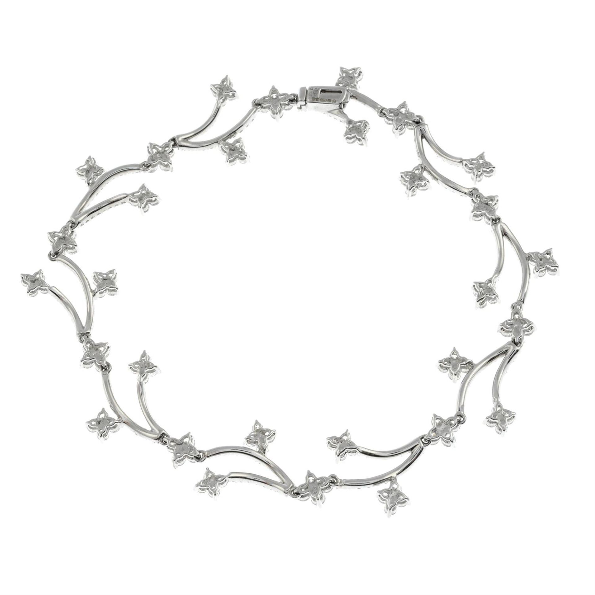 An 18ct gold brilliant-cut diamond floral bracelet. - Image 3 of 3