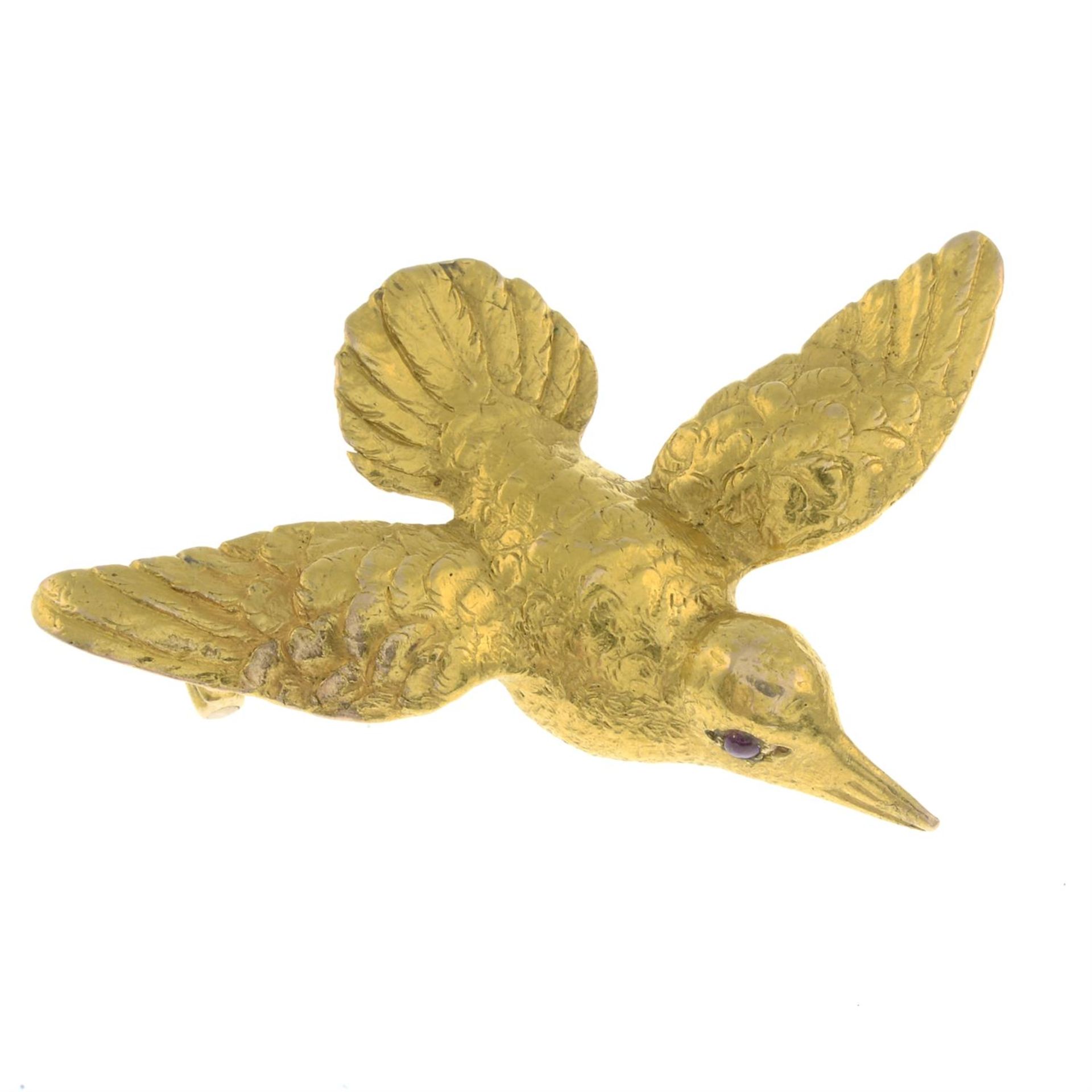 An early 20th century gold bird brooch, possibly a hummingbird, with ruby eyes. - Image 2 of 4